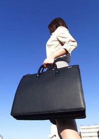 重い荷物を持った事による肩の痛み